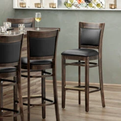 Lancaster Table & Seating Sofia Vintage Finish Upholstered Back Bar Height Chair With Black Padded Seat